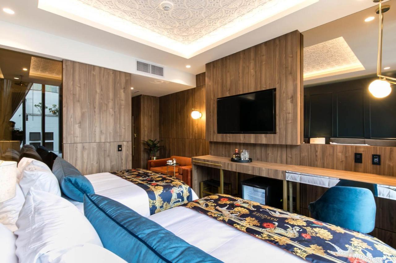 Hotel Marquee Медельин Экстерьер фото A room at the hotel